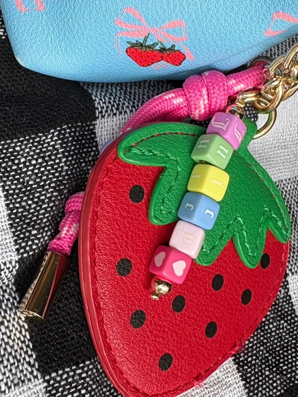 Juicy Couture Light Blue Strawberry Print Wristlet with strawberry bag charm